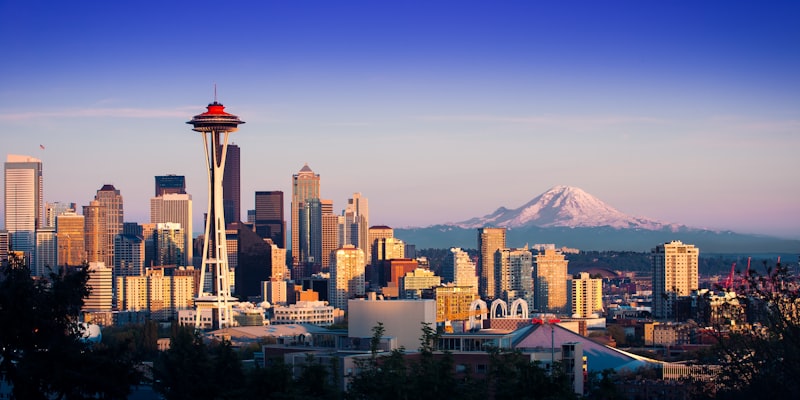 Hire vibe coders in Seattle - Seattle skyline with the Space Needle and Mount Rainier